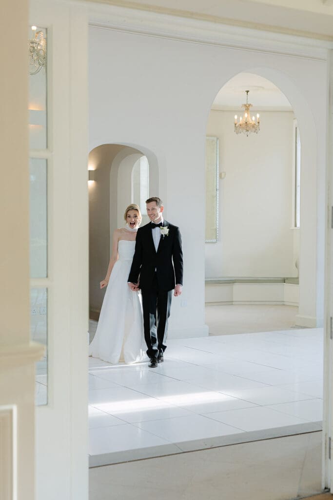 Iscoyd Park offers an elegant backdrop for this bride and groom in black tie