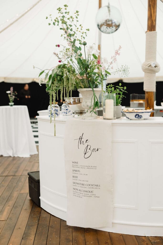 Bar setup designed by LMJ Weddings inside a sperry tent marquee in cheshire